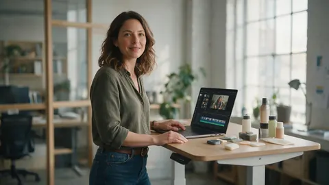 A marketing manager at a standing desk with a video timeline on screen
