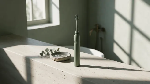 Electric toothbrush editorial: AI-generated editorial commercial frame of an electric toothbrush on stone