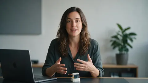 A founder presenting a product prototype to camera