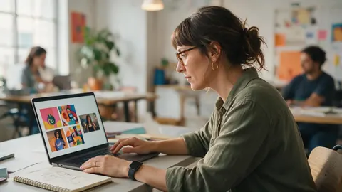 A freelance designer with brand images on her laptop