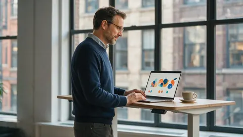 A founder with a pitch deck slide on his laptop