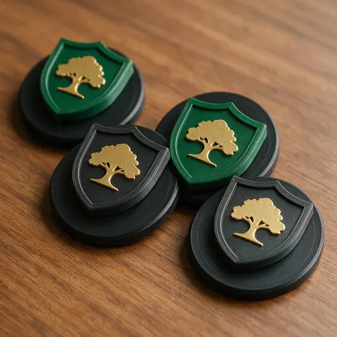 3D printed shield badges with an oak tree emblem