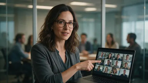 A marketing lead reviewing video versions in a meeting room
