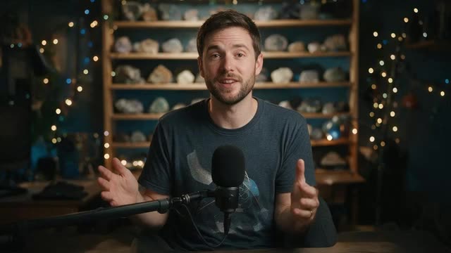 Looping clip of a creator talking to camera in a home studio