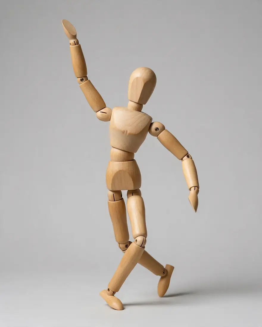 Wooden mannequin pose and the dancer in the same pose — before