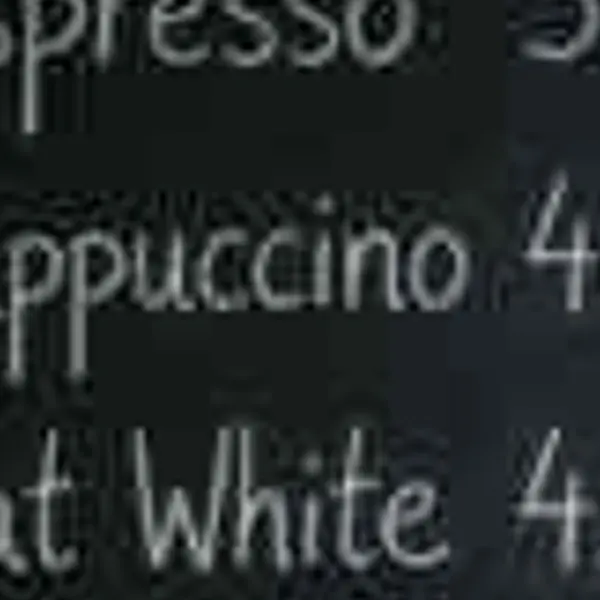 Cafe chalkboard menu listing coffee drinks and prices — the 360 px JPEG original stretched to the same size (bicubic)